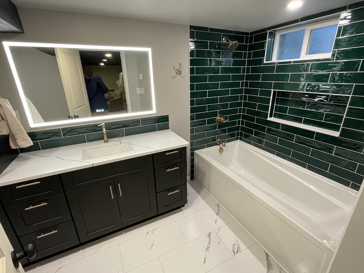 Green tile bathroom with custom vanity - Property Matters LLC
